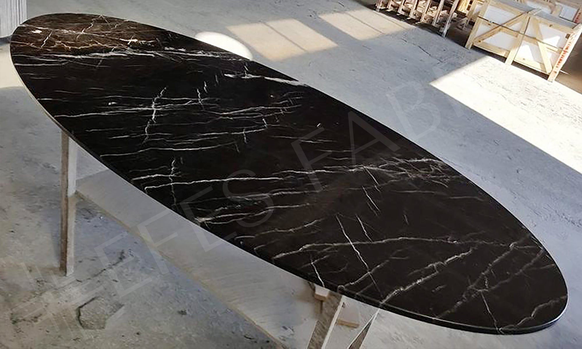 black marble ellipse table top